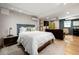 Bright bedroom featuring hardwood floors, recessed lighting, and cozy decor at 4323 E Durham Cir, Stone Mountain, GA 30083