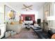 Comfortable living room featuring a neutral color palette, modern artwork, and open floor plan at 4323 E Durham Cir, Stone Mountain, GA 30083