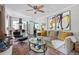 Comfortable living room featuring a neutral color palette, modern artwork, and open floor plan at 4323 E Durham Cir, Stone Mountain, GA 30083