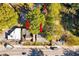 An aerial view shows a home on a street with surrounding trees and cars at 1644 Lakewood Se Ave, Atlanta, GA 30315