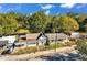 Aerial view of a residential property surrounded by lush trees offering a serene and private setting at 1644 Lakewood Se Ave, Atlanta, GA 30315