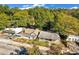 Overhead shot of a home nestled among mature trees, providing a tranquil and secluded environment at 1644 Lakewood Se Ave, Atlanta, GA 30315