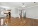 Open living room with views to the kitchen and staircase at 385 Sweet Ivy Ln, Lawrenceville, GA 30043