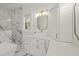 Bright bathroom with a marble shower, vanity, and elegant fixtures at 441 Pumpkinvine Rd, Acworth, GA 30101
