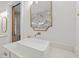 Bathroom vanity with gold accents, marble countertops and backsplash, and luxury finishes at 441 Pumpkinvine Rd, Acworth, GA 30101