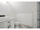 Chic bathroom featuring modern vanity, unique flooring, and tiled shower at 441 Pumpkinvine Rd, Acworth, GA 30101