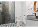 Modern bathroom design featuring a glass shower, and gray tiling throughout at 441 Pumpkinvine Rd, Acworth, GA 30101