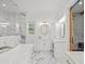 Stylish bathroom with marble floors, gold fixtures, and a glass-enclosed shower at 441 Pumpkinvine Rd, Acworth, GA 30101
