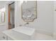 Well-lit bathroom showcasing a modern vanity, square sink, and stylish fixtures, exuding elegance and comfort at 441 Pumpkinvine Rd, Acworth, GA 30101