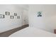 Minimalist bedroom with clean white walls, modern art, and polished concrete floors at 441 Pumpkinvine Rd, Acworth, GA 30101