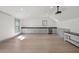 Large bonus room with wet bar, ample storage, and projector setup at 441 Pumpkinvine Rd, Acworth, GA 30101