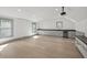 Large bonus room with wet bar, ample storage, and projector setup at 441 Pumpkinvine Rd, Acworth, GA 30101