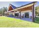 Modern farmhouse with spacious porch, outdoor seating and well-manicured lawn at 441 Pumpkinvine Rd, Acworth, GA 30101