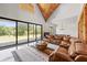 Spacious living area with large sliding doors, vaulted ceilings, and modern decor at 441 Pumpkinvine Rd, Acworth, GA 30101