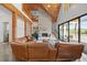 Bright and spacious living room with high ceilings, fireplace, and sliding doors to the patio at 441 Pumpkinvine Rd, Acworth, GA 30101
