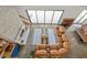 Open-concept living room with brick fireplace, high ceilings, and large windows at 441 Pumpkinvine Rd, Acworth, GA 30101