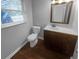 Clean bathroom with a vanity and toilet at 4958 Meadow Ln, Marietta, GA 30068