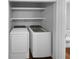 Convenient laundry area with modern washer and dryer at 4958 Meadow Ln, Marietta, GA 30068