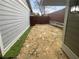 Charming outdoor patio with stone pavers and wooden fencing, perfect for enjoying outdoor living at 4958 Meadow Ln, Marietta, GA 30068