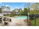 Refreshing community pool with comfortable lounge area perfect for relaxation and soaking up the sun at 4958 Meadow Ln, Marietta, GA 30068