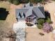 Aerial shot of a home showcasing the roof, driveway, and landscaped yard at 100 Cross Creek Dr, Lilburn, GA 30047
