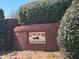 Brick entrance sign for Cross Creek community surrounded by mature greenery and landscaping at 100 Cross Creek Dr, Lilburn, GA 30047