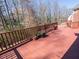 Spacious wooden deck perfect for outdoor entertaining, surrounded by a natural wooded setting at 100 Cross Creek Dr, Lilburn, GA 30047