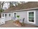 Inviting deck offers outdoor seating and complements the home's exterior at 3776 Powers Ferry Nw Rd, Atlanta, GA 30342