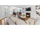 Comfortable living room features hardwood floors, fireplace, and French doors to the backyard at 3776 Powers Ferry Nw Rd, Atlanta, GA 30342