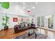 Comfortable living room with a vaulted ceiling, hardwood floors, and an open layout at 3776 Powers Ferry Nw Rd, Atlanta, GA 30342