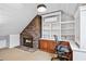 Office area boasts a stone fireplace, built-in shelving, and lots of natural light at 3776 Powers Ferry Nw Rd, Atlanta, GA 30342