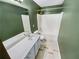 Stylish bathroom with a dual sink vanity, sleek faucet, and a shower-tub combination at 412 Pine Log Ct, Canton, GA 30115