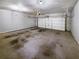 Empty two car garage, ready for parking and storage at 412 Pine Log Ct, Canton, GA 30115