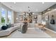 Stylish living room with a comfortable seating area, guitar decor, and plenty of natural light at 420 Hatcher Ct, Hampton, GA 30228