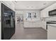 Modern kitchen with white cabinetry, stainless steel appliances and access to a deck at 1095 Boulevard Se Dr, Atlanta, GA 30317