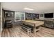 Finished basement featuring game table, wet bar, and seating area at 2982 Huntshire Pl, Atlanta, GA 30340