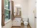 Bathroom featuring granite countertops, tile flooring, and lots of natural light at 2982 Huntshire Pl, Atlanta, GA 30340