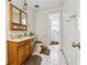 Neutral bathroom featuring a vanity, toilet, ceramic tile floors, and a shower at 1532 Wethersfield Rd, Snellville, GA 30078