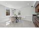 Bright dining area features a round table, four chairs, and sleek cabinetry at 185 E Wesley Ne Rd, Atlanta, GA 30305