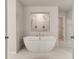 Luxurious bathroom with stand alone tub and a double shower at 428 Hatcher Ct, Hampton, GA 30228