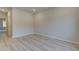 Neutral bedroom with durable floors, ample natural light, and fresh, white trim at 428 Hatcher Ct, Hampton, GA 30228