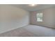 Cozy bedroom with carpet flooring, a window, and a neutral color palette at 428 Hatcher Ct, Hampton, GA 30228