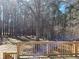 Backyard view from the elevated wooden deck at 5685 Mccoy Nw Rd, Acworth, GA 30101