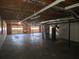 Unfinished basement with access to garage, offering a flexible space to customize at 5685 Mccoy Nw Rd, Acworth, GA 30101