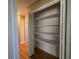 Hallway closet with shelving provides extra storage at 5685 Mccoy Nw Rd, Acworth, GA 30101