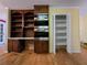Well-designed kitchen featuring stainless steel appliances, granite countertops, storage shelves, and a pantry at 5685 Mccoy Nw Rd, Acworth, GA 30101