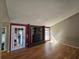 Spacious living room with hardwood floors and a unique fireplace at 5685 Mccoy Nw Rd, Acworth, GA 30101