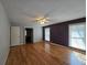 Spacious main bedroom with hardwood floors and windows offering natural light at 5685 Mccoy Nw Rd, Acworth, GA 30101