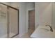Modern bathroom with a glass-enclosed shower, vanity, and storage, designed for comfort and functionality at 141 Compass Rd, Hampton, GA 30228