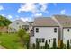 View of backyard with green space, privacy fence, and well-maintained lawn at 319 Hayden Cir, Woodstock, GA 30189